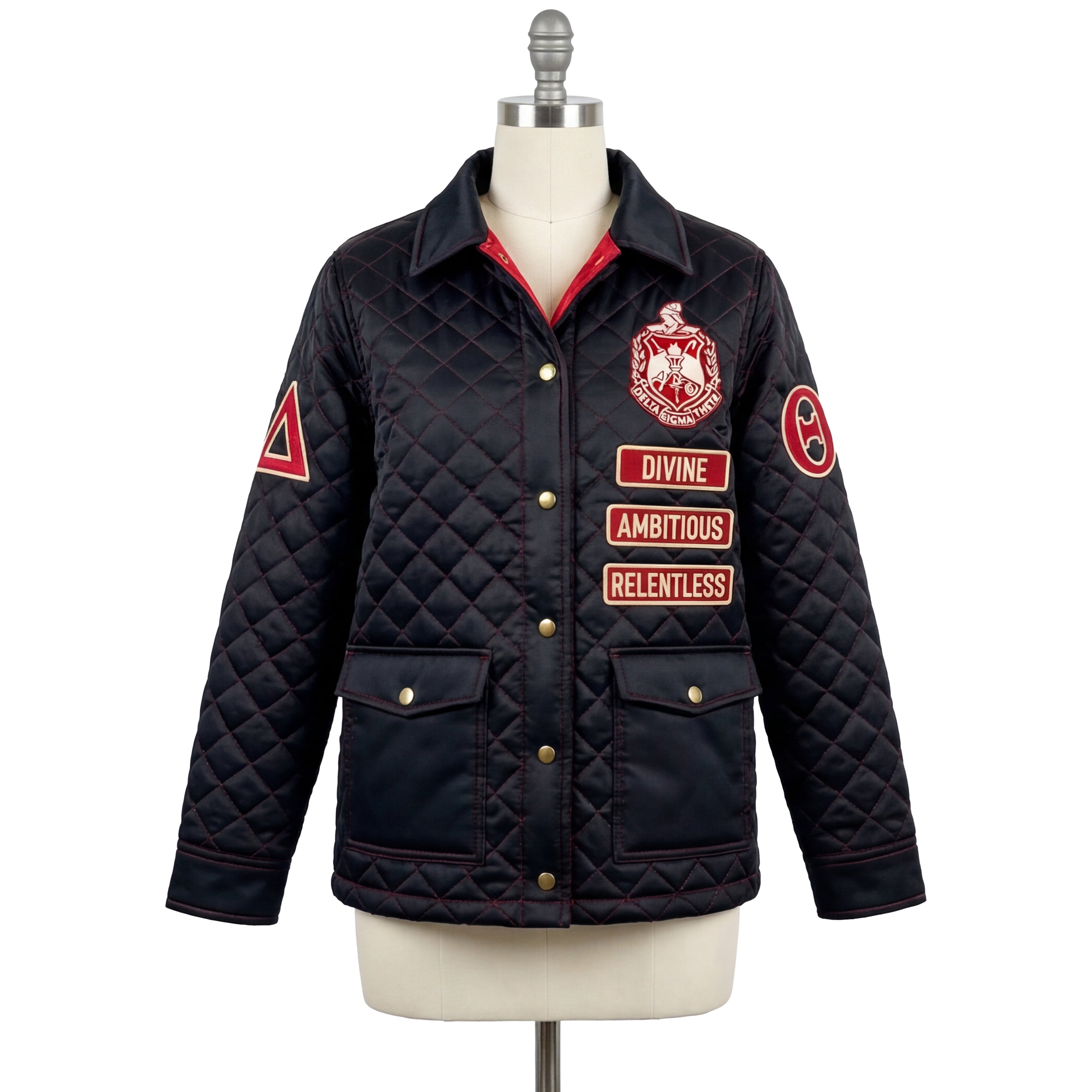 Black quilted jacket with patches on a mannequin against a white background