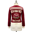 Red and white varsity jacket with Delta Sigma Theta logo on a mannequin